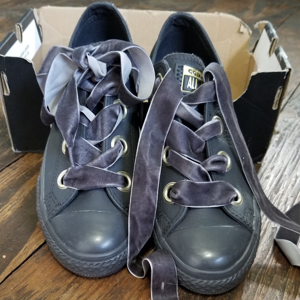 Gray and gold Converse